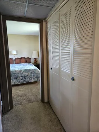a view of a bedroom from a hallway