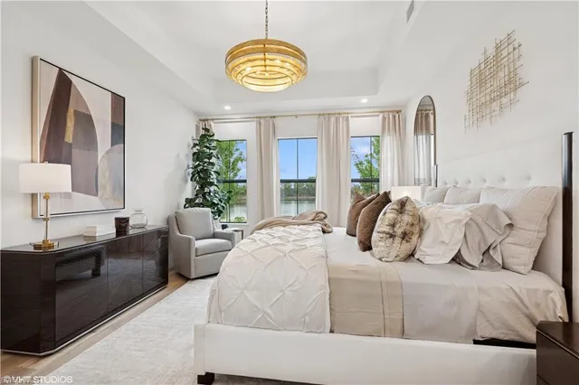 a bedroom with bed and window