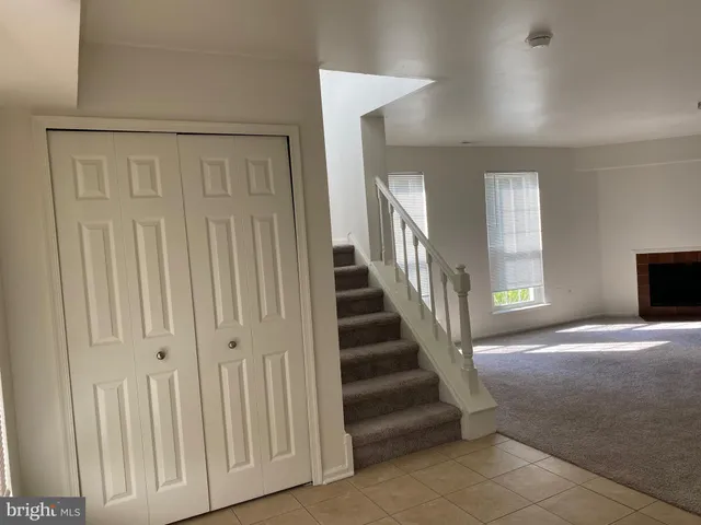 a view of entryway with stairs