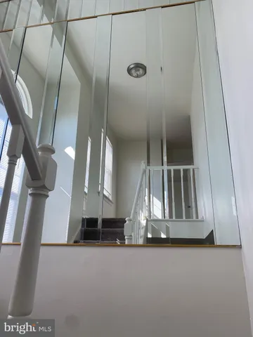 an empty room with a empty space and window