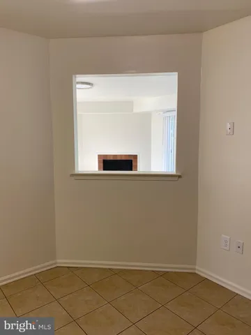 a view of a room that has a window