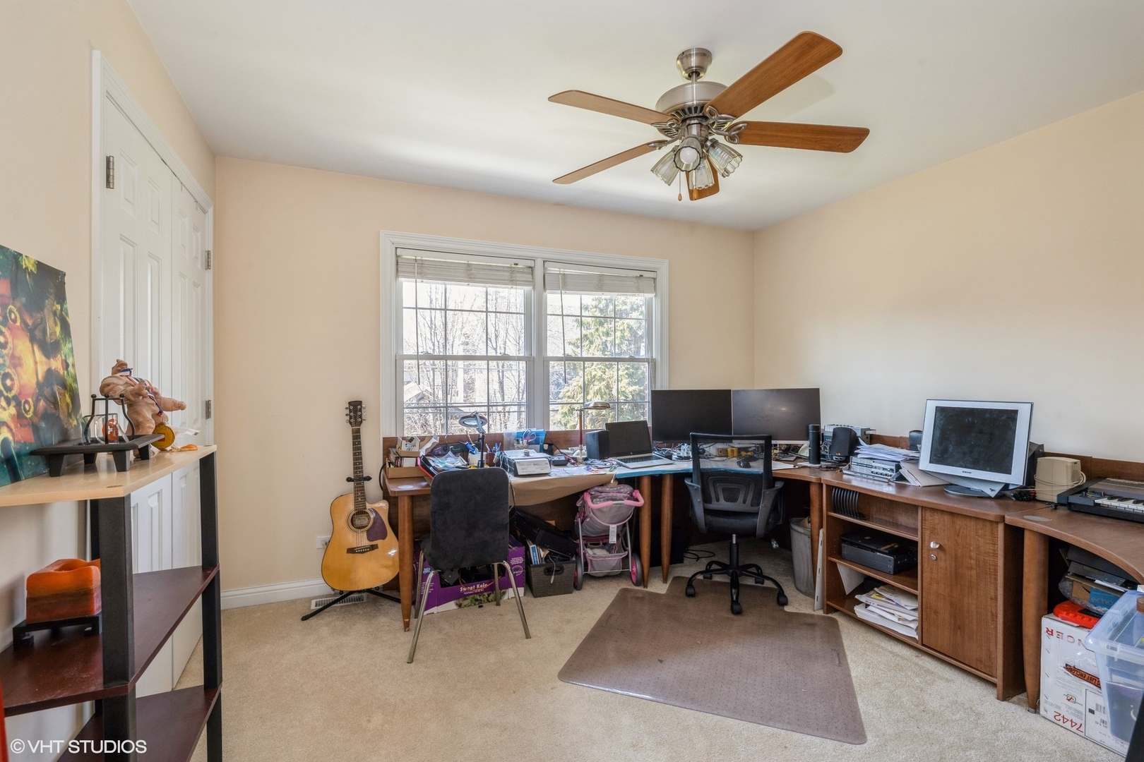 972 Spring Road Elmhurst, IL 60126 - Photo 20 of 30 a view of a workspace with furniture and a window