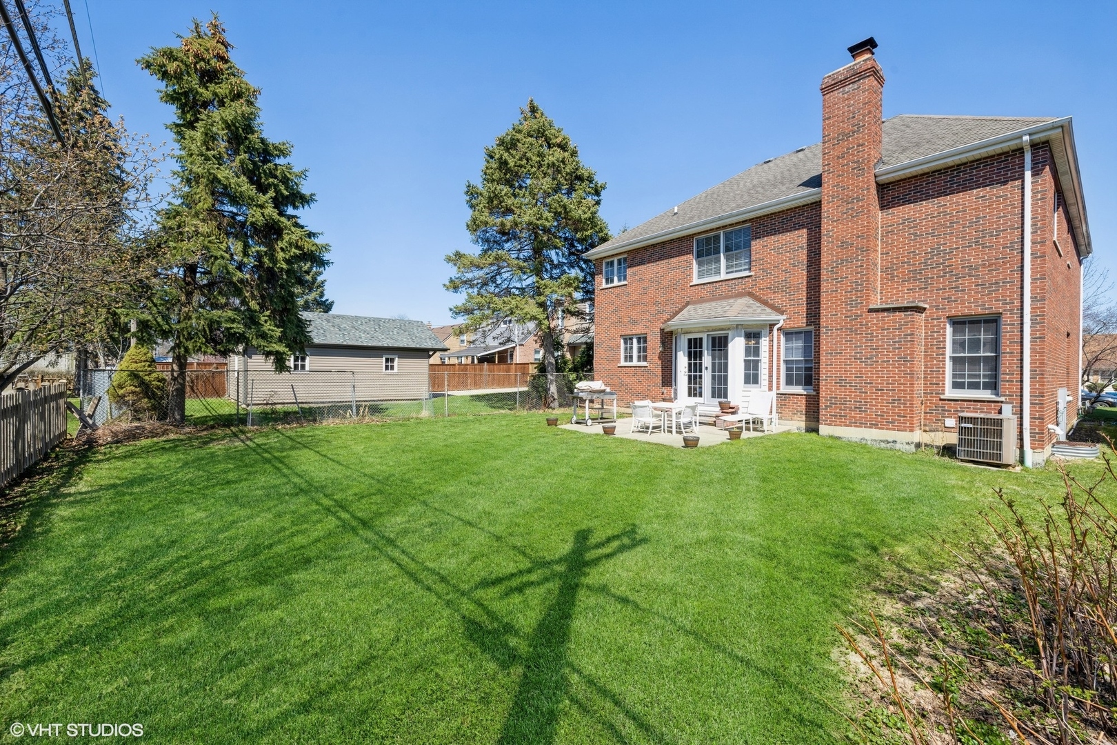 972 Spring Road Elmhurst, IL 60126 - Photo 25 of 30 a front view of a house with garden