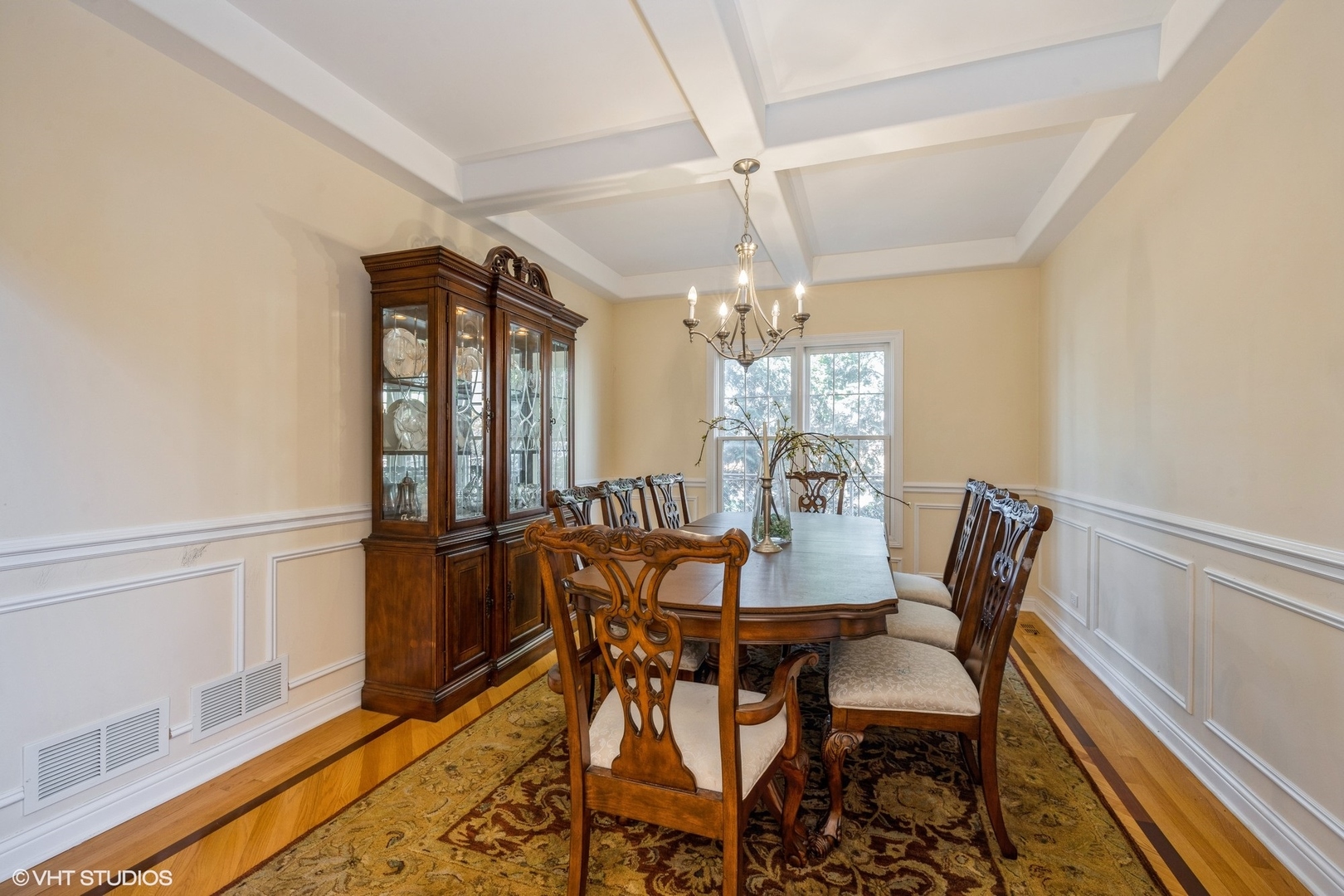 972 Spring Road Elmhurst, IL 60126 - Photo 9 of 30 a view of a dining room with furniture and chandelier