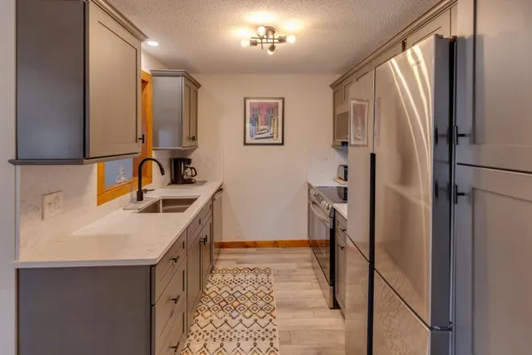 $329,500 | 44 Church Street, Unit 1, Lincoln, NH 03251