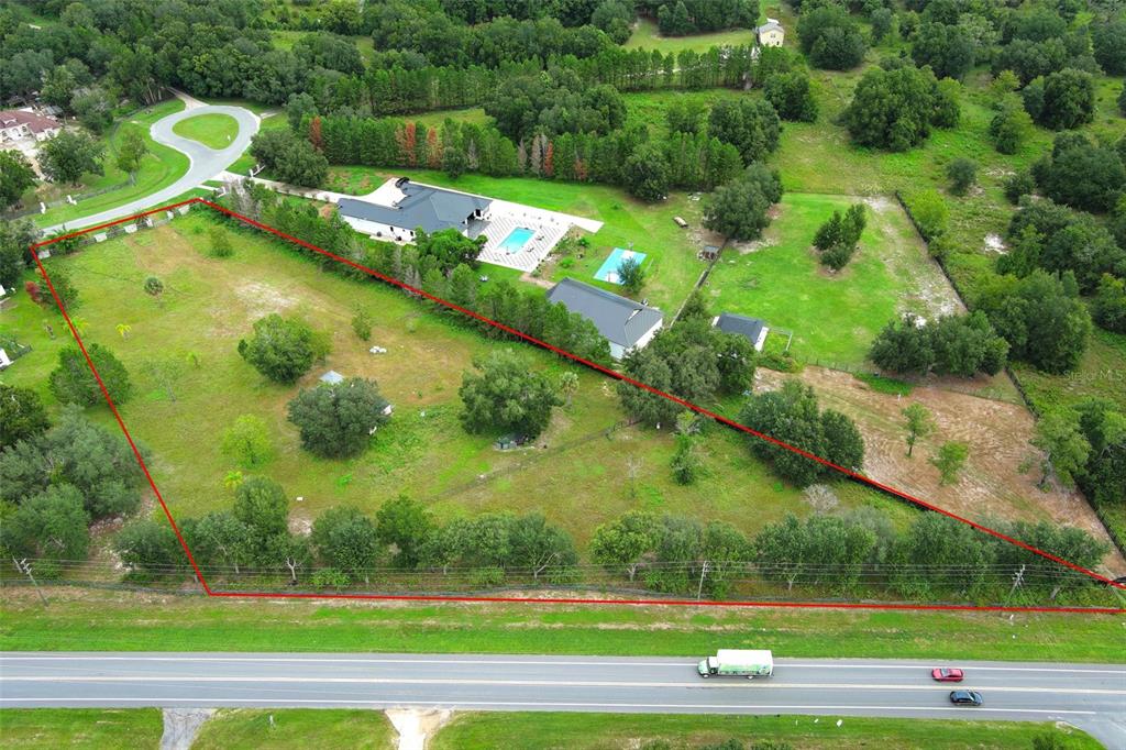 34534 Tree Frog Lane Eustis, FL 32736 - Photo 15 of 17 a view of a yard