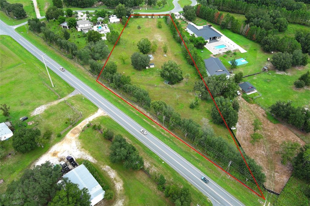 34534 Tree Frog Lane Eustis, FL 32736 - Photo 6 of 17 a view of a garden