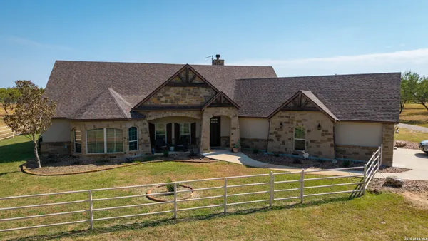 a view of house with outdoor space