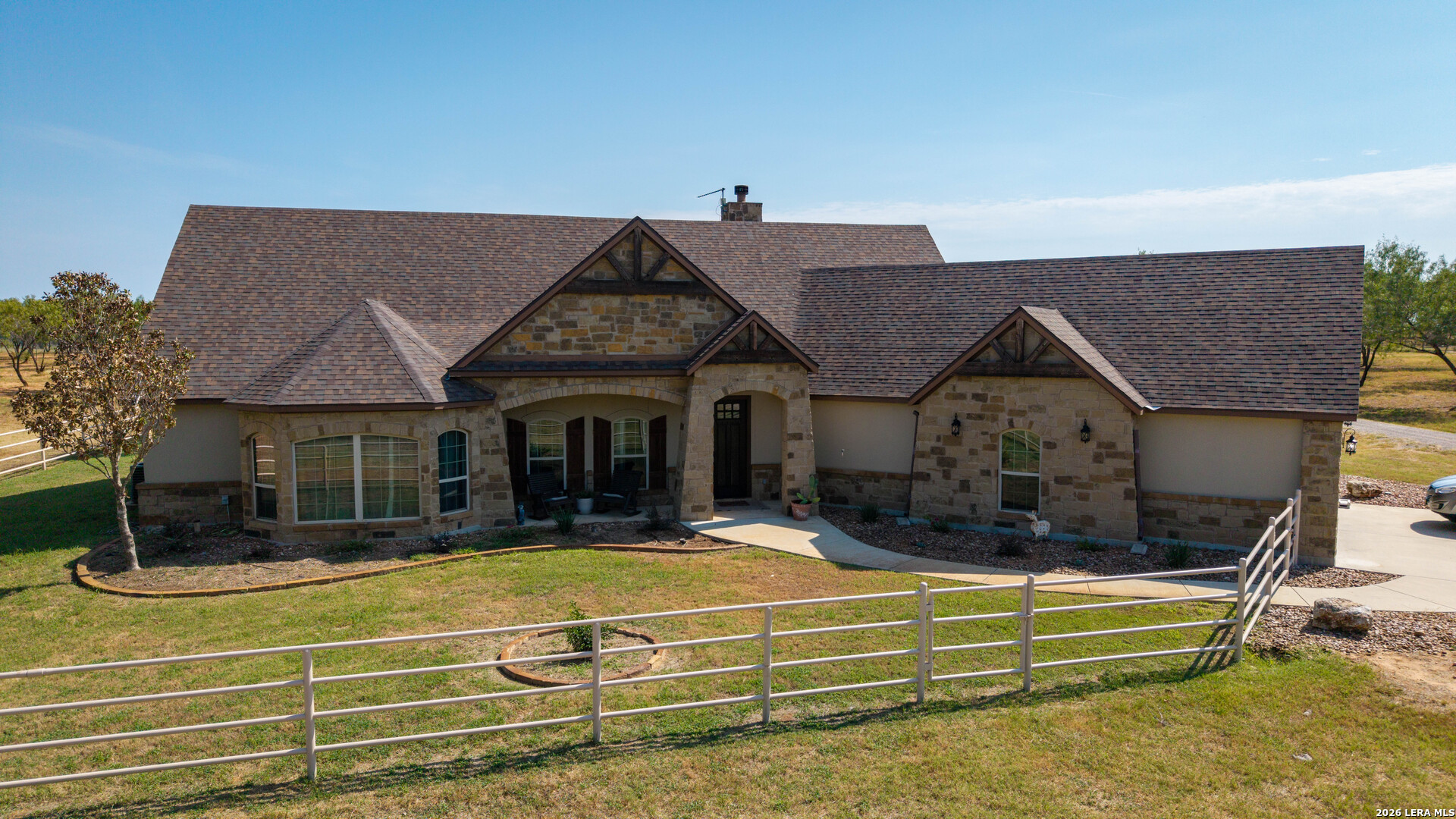 5002 Fm 476 Poteet, TX 78065 - Photo 1 of 50 a view of house with outdoor space