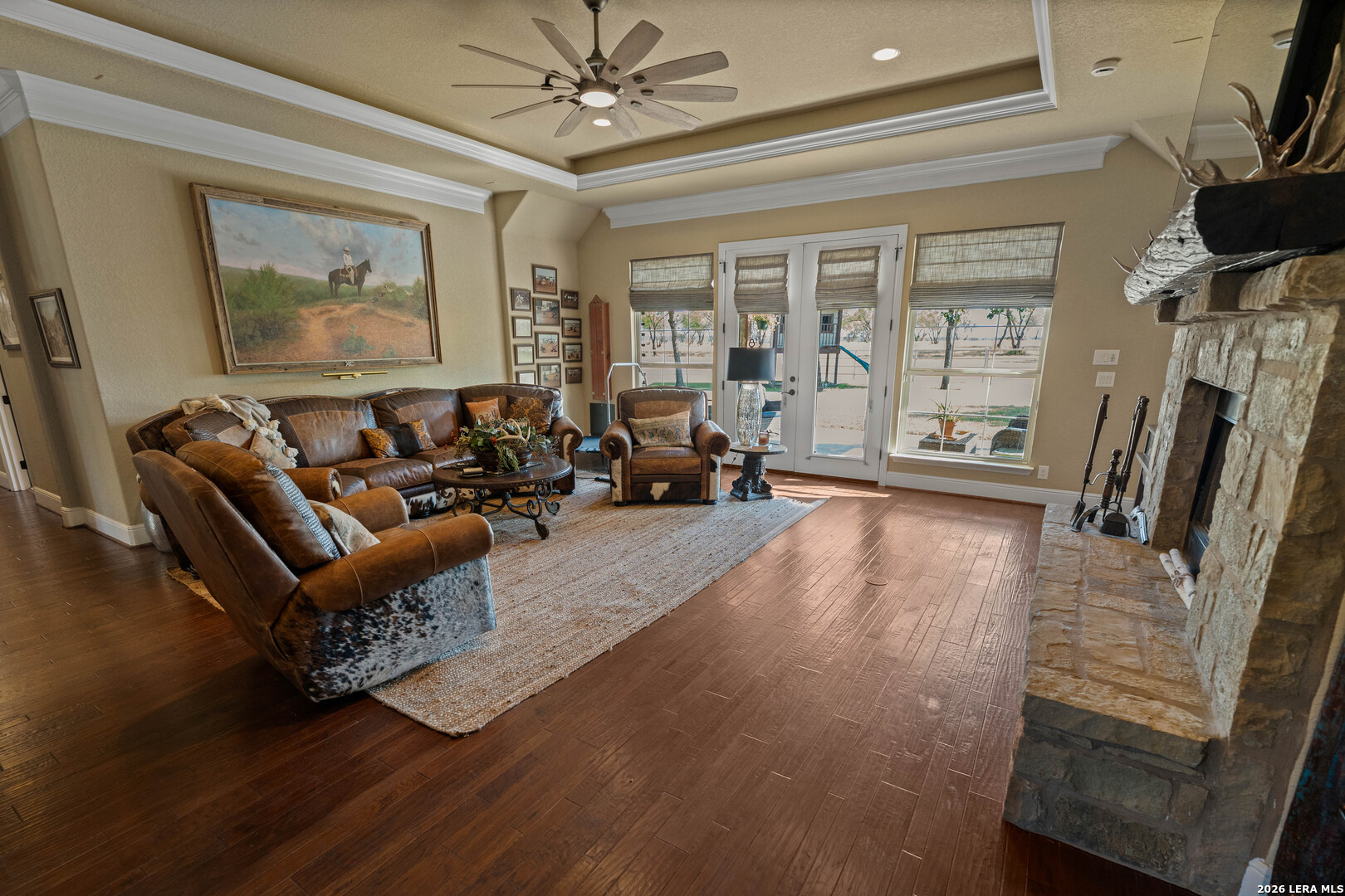 5002 Fm 476 Poteet, TX 78065 - Photo 33 of 50 a living room with furniture and a flat screen tv