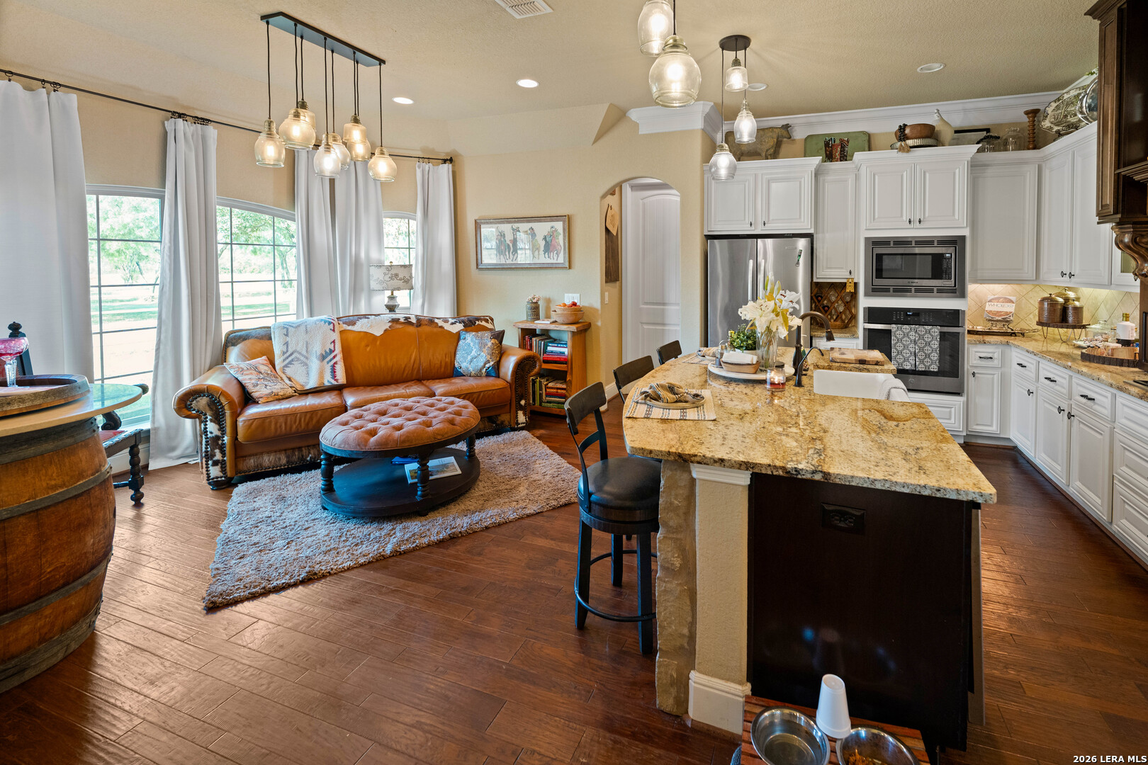 5002 Fm 476 Poteet, TX 78065 - Photo 37 of 50 a living room with lots of furniture and kitchen view