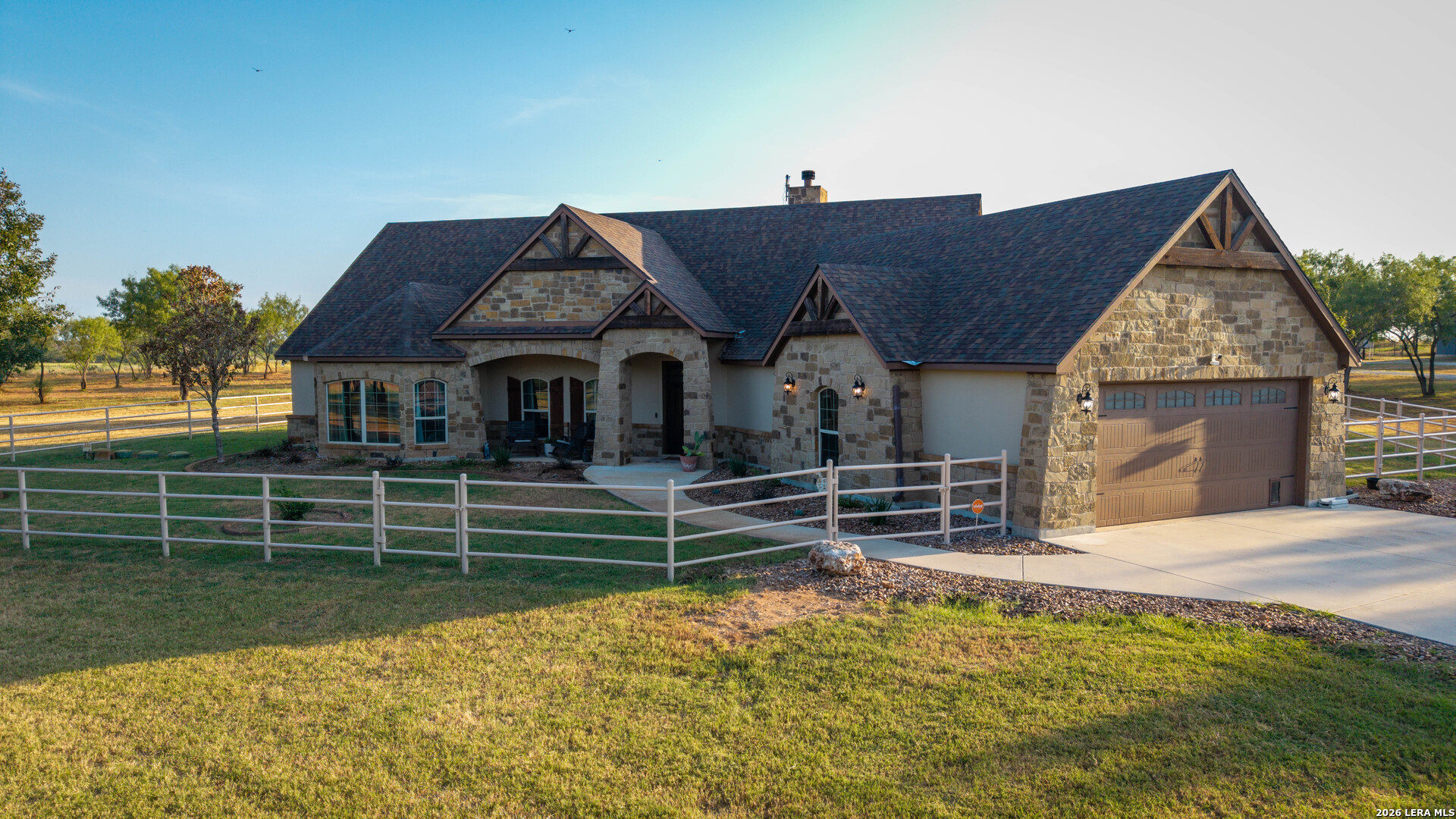 5002 Fm 476 Poteet, TX 78065 - Photo 4 of 50 a front view of a house with a yard