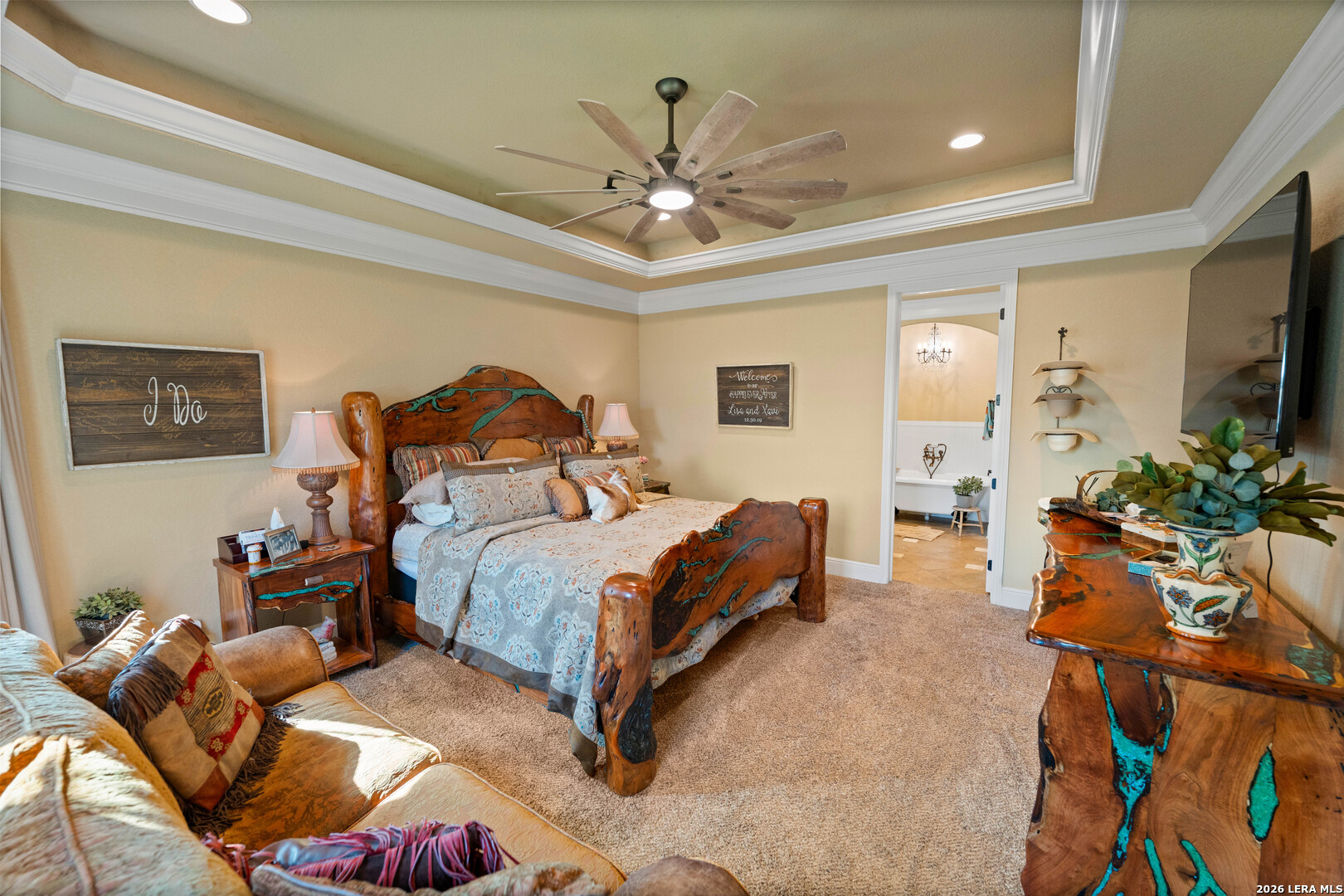 5002 Fm 476 Poteet, TX 78065 - Photo 41 of 50 a bedroom with a bed and ceiling fan