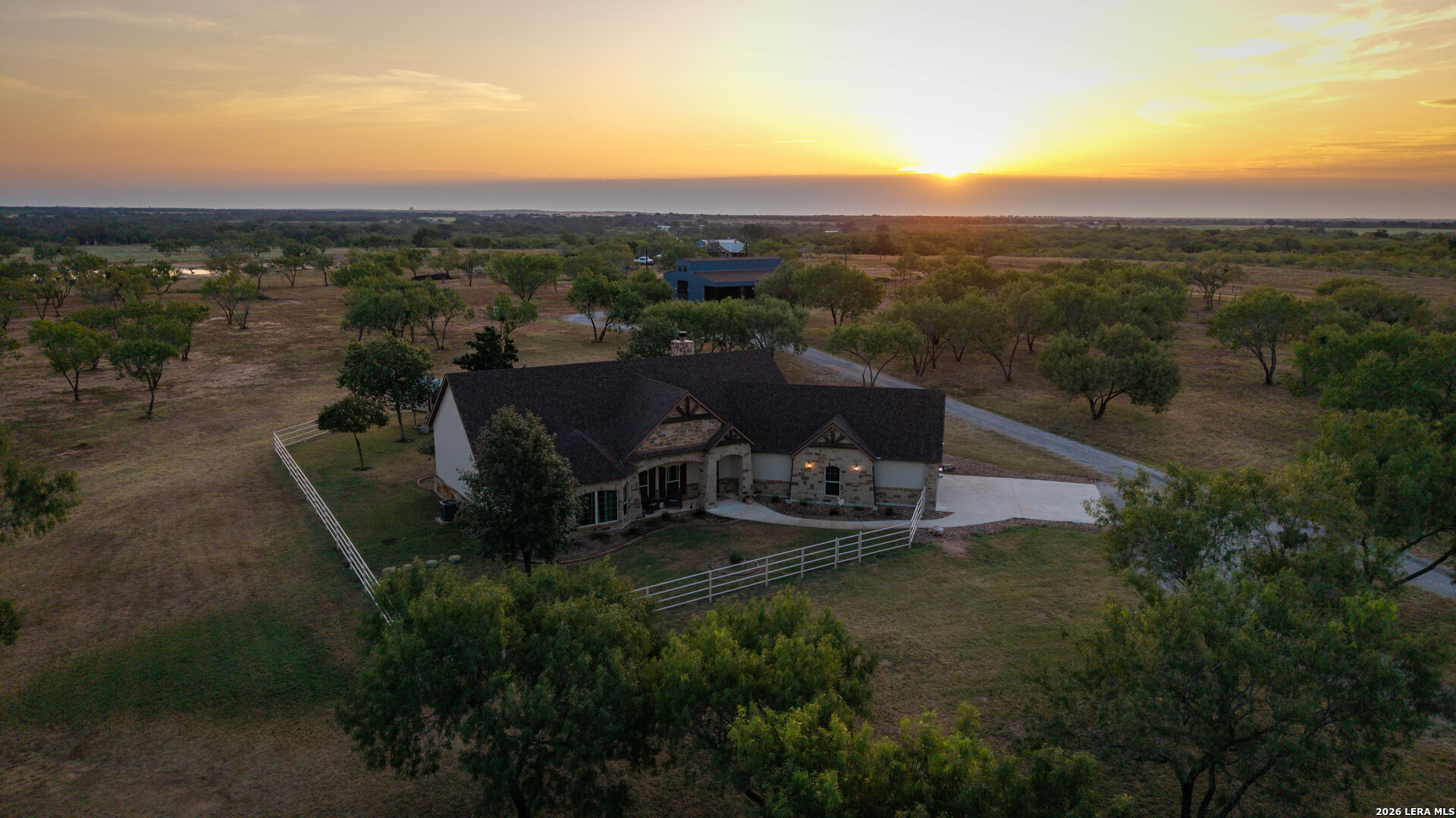 5002 Fm 476 Poteet, TX 78065 - Photo 9 of 50 a view of a terrace with a garden and mountain view