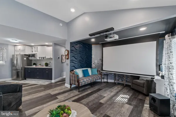 a bedroom with furniture and a gym equipment