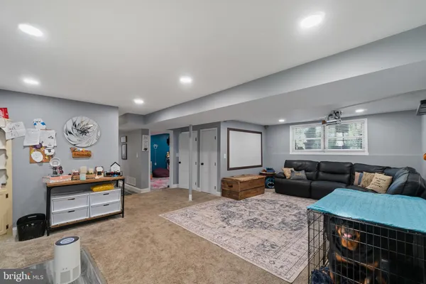 a bedroom with two beds and a walk in closet