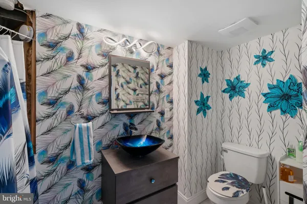 a view of a closet with storage