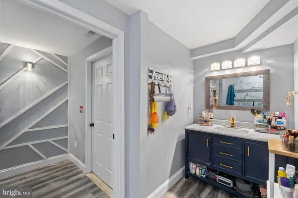 a bathroom with a toilet and a sink