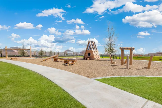 a view of a park with swings