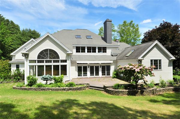 284 South Great Road Lincoln, MA 01773 - Photo 2 of 13 a front view of a house with a yard