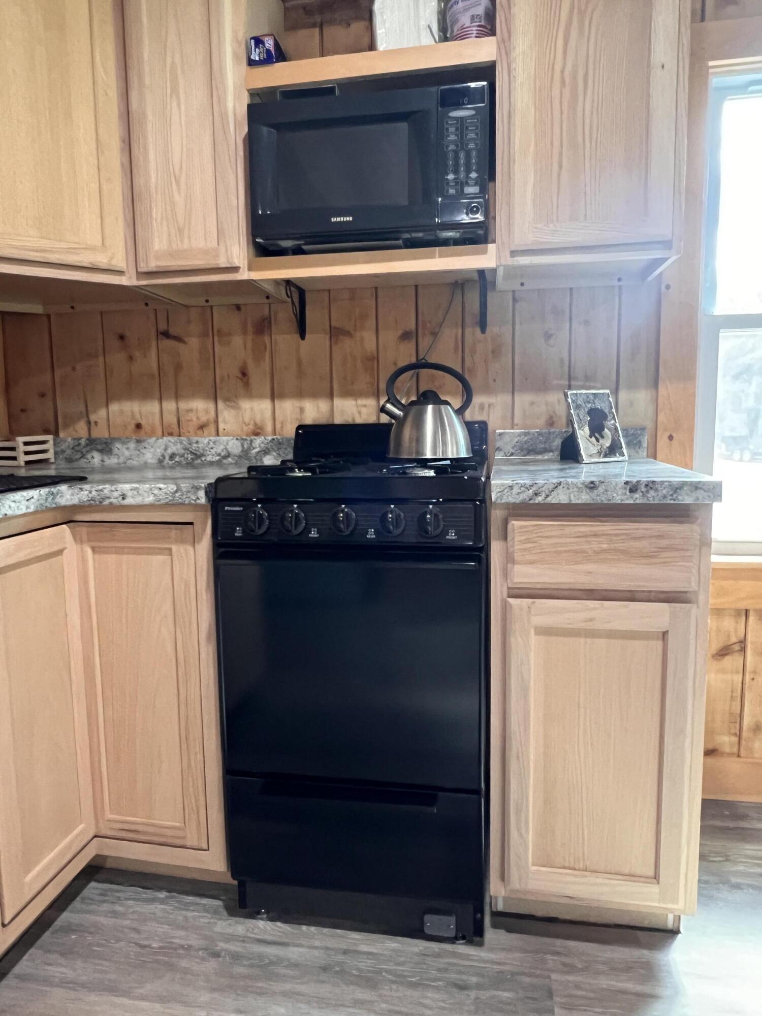 540 Tate Road Corinth, ME 04427 - Photo 14 of 33 Gas Stove