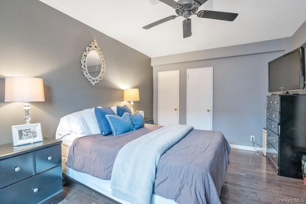 620 Pelham Road, Unit 6G New Rochelle, NY 10805 - Photo 14 of 22 a bedroom with a bed and wooden floor