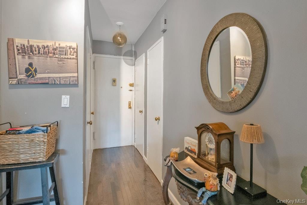 620 Pelham Road, Unit 6G New Rochelle, NY 10805 - Photo 5 of 22 a view of a livingroom with furniture and wooden floor