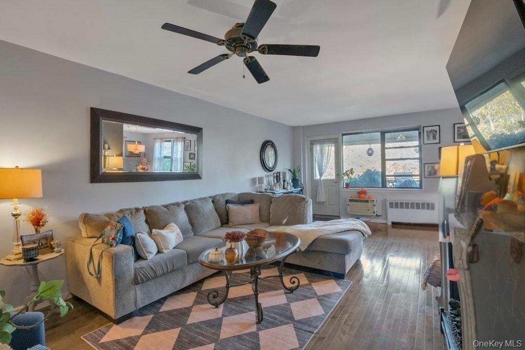 620 Pelham Road, Unit 6G New Rochelle, NY 10805 - Photo 6 of 22 a living room with furniture and a window