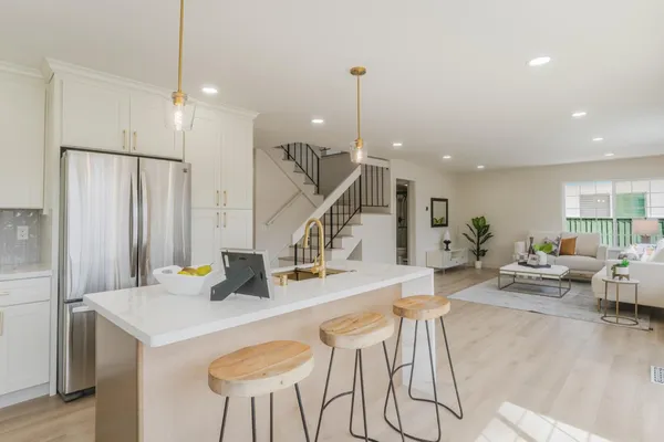 a view of a floor to ceiling window with wooden floor