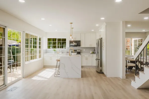 a vase of flowers sitting on a table