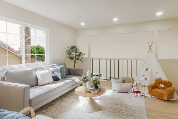 a bedroom with a bed and hallway