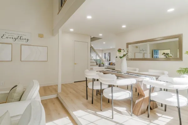 a view of a dining room with furniture