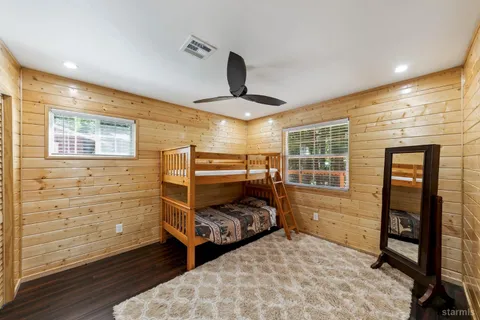 a view of an entryway with wooden floor