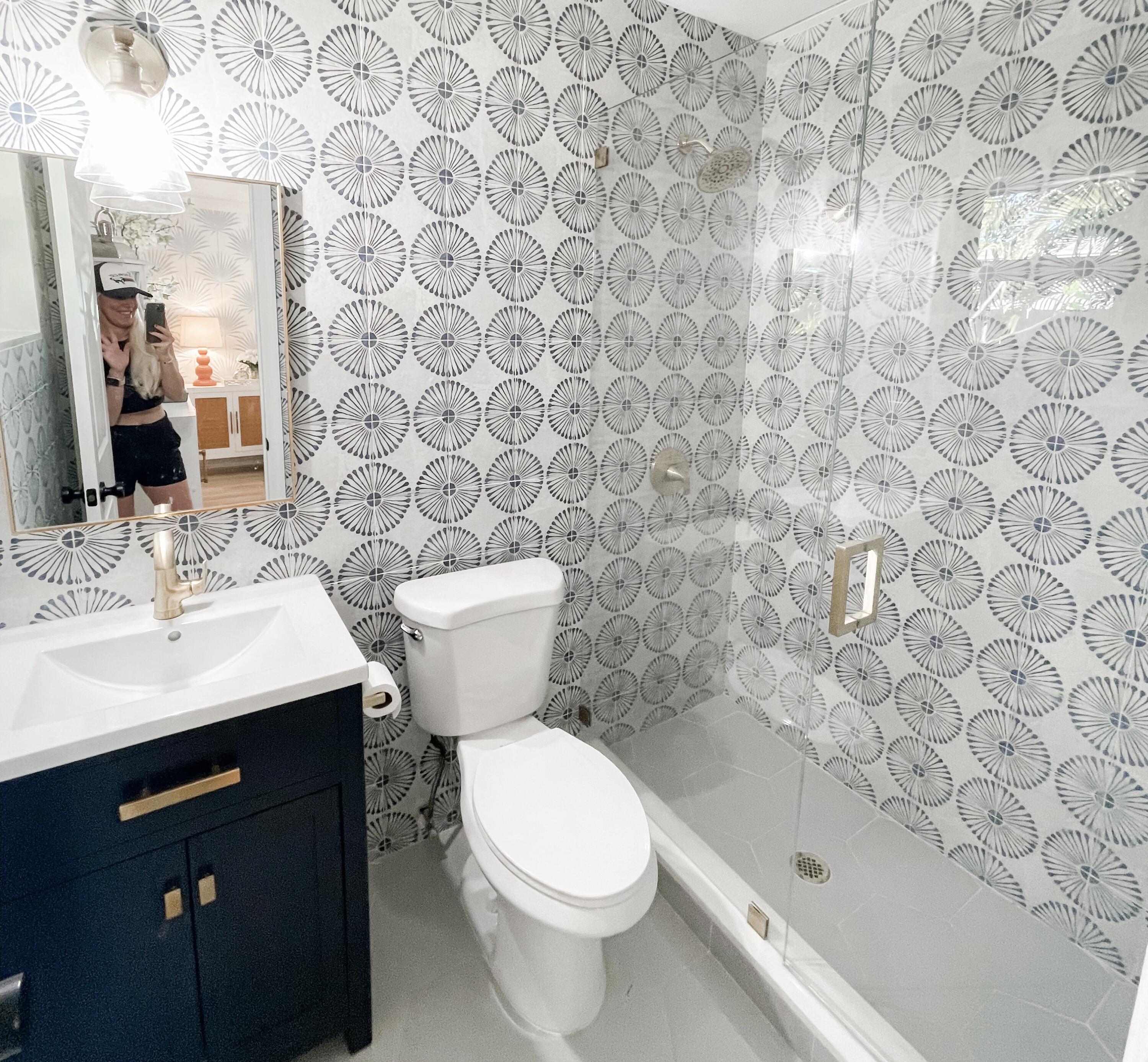 7 Fayette Drive Ocean Ridge, FL 33435 - Photo 19 of 30 a bathroom with a sink a toilet and a mirror