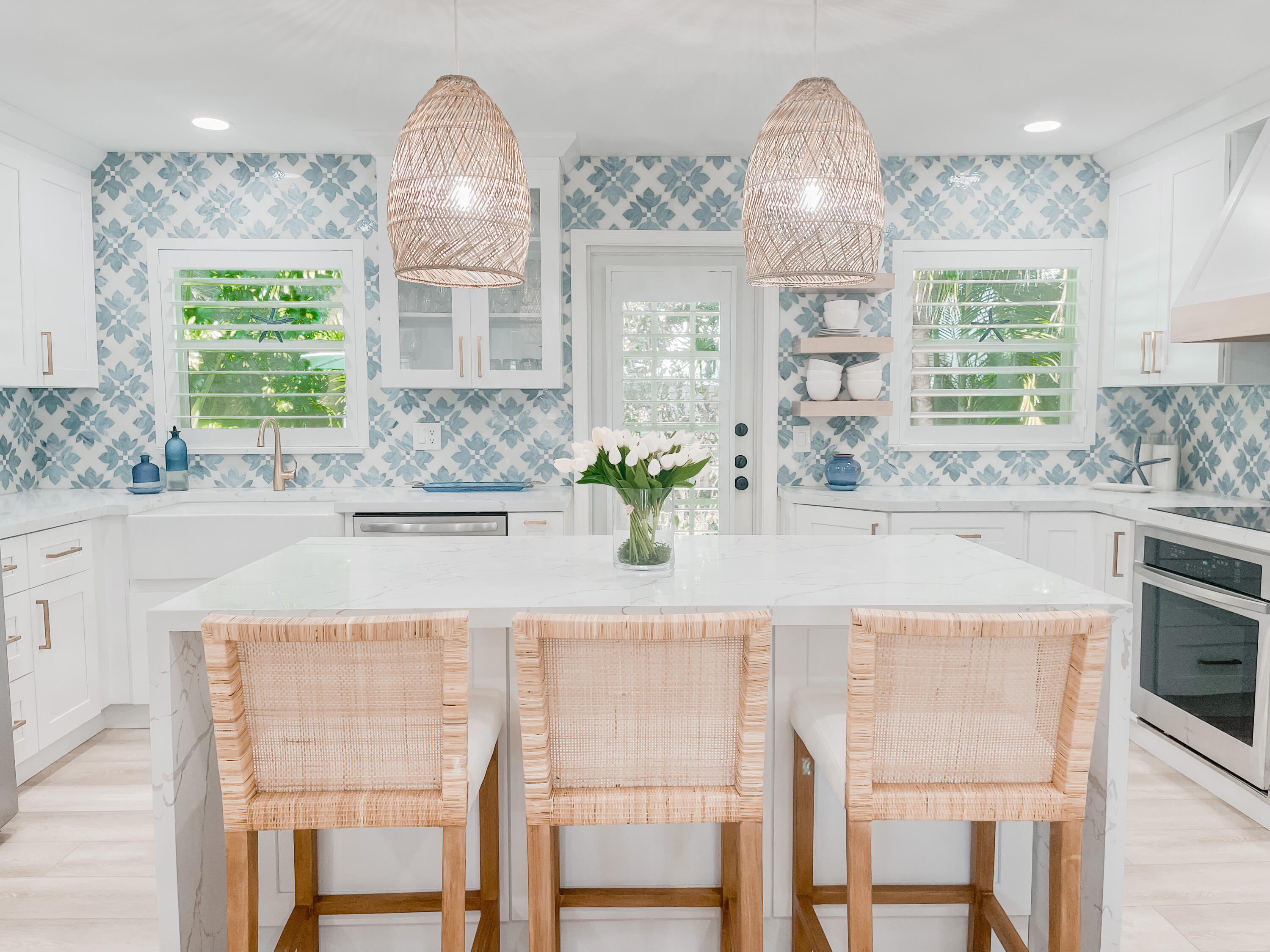 7 Fayette Drive Ocean Ridge, FL 33435 - Photo 8 of 30 a dining table with chairs and chandelier