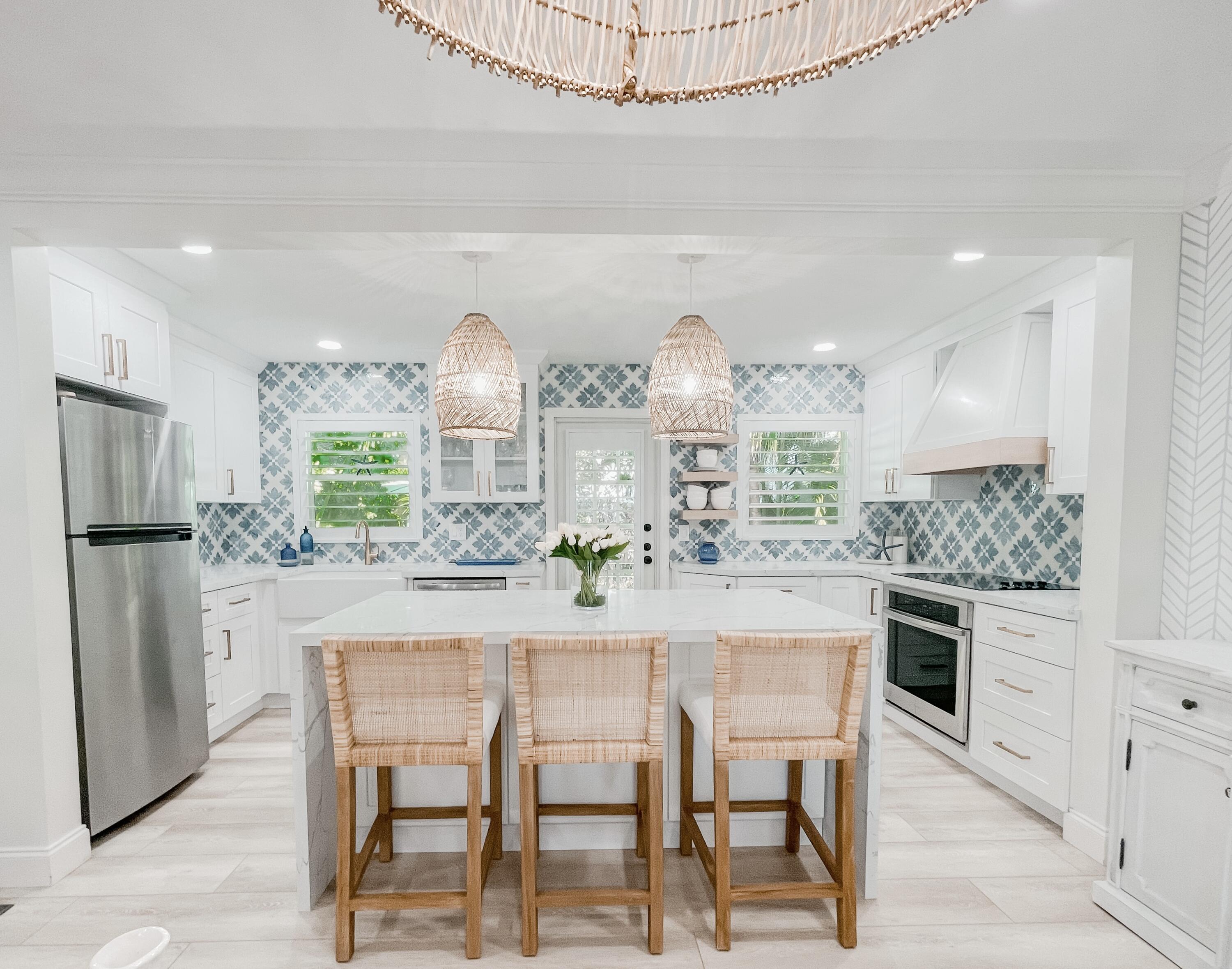 7 Fayette Drive Ocean Ridge, FL 33435 - Photo 9 of 30 a kitchen with a table and chairs in it