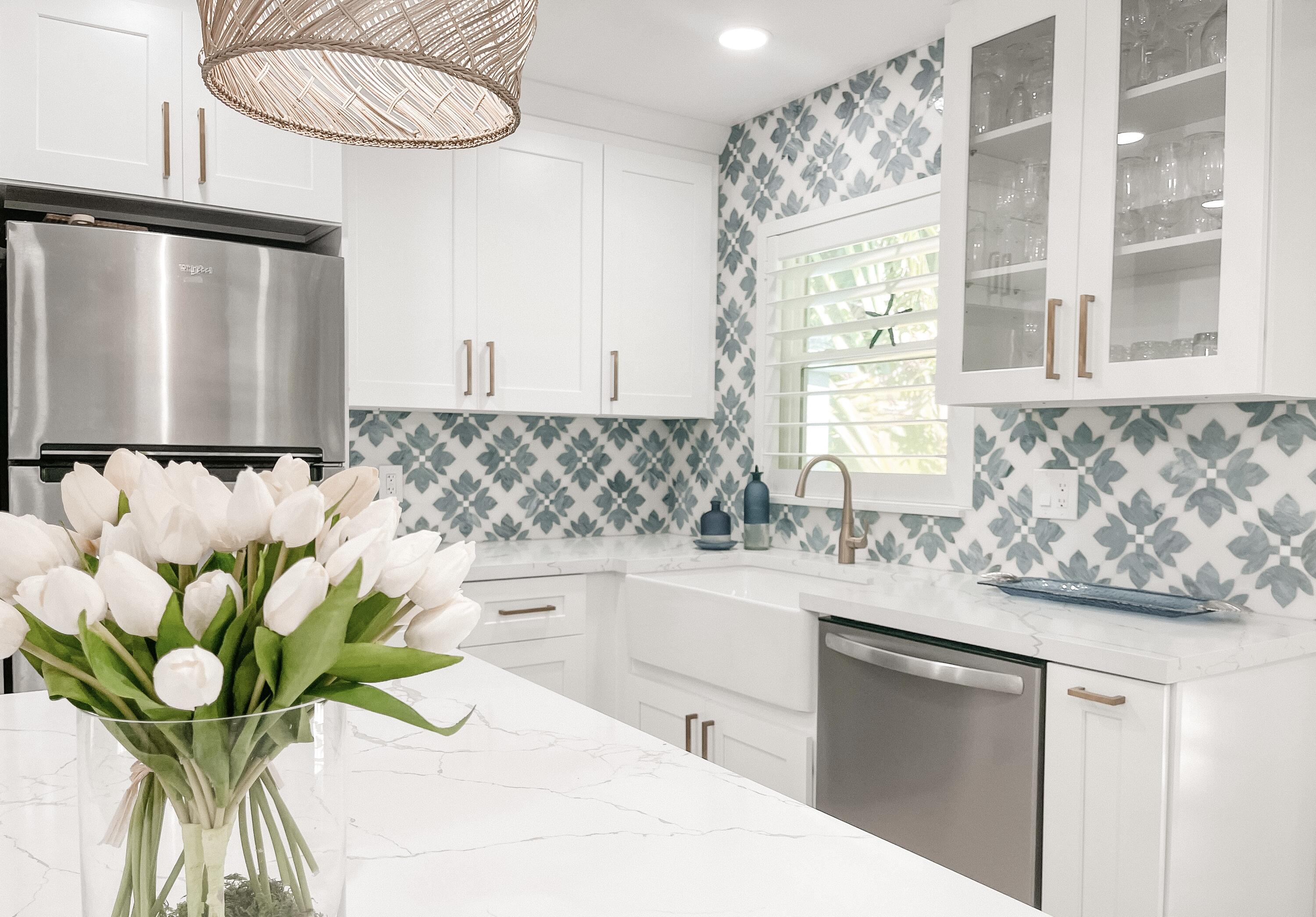 7 Fayette Drive Ocean Ridge, FL 33435 - Photo 10 of 30 a bathroom with a sink a mirror and a bathtub with shower