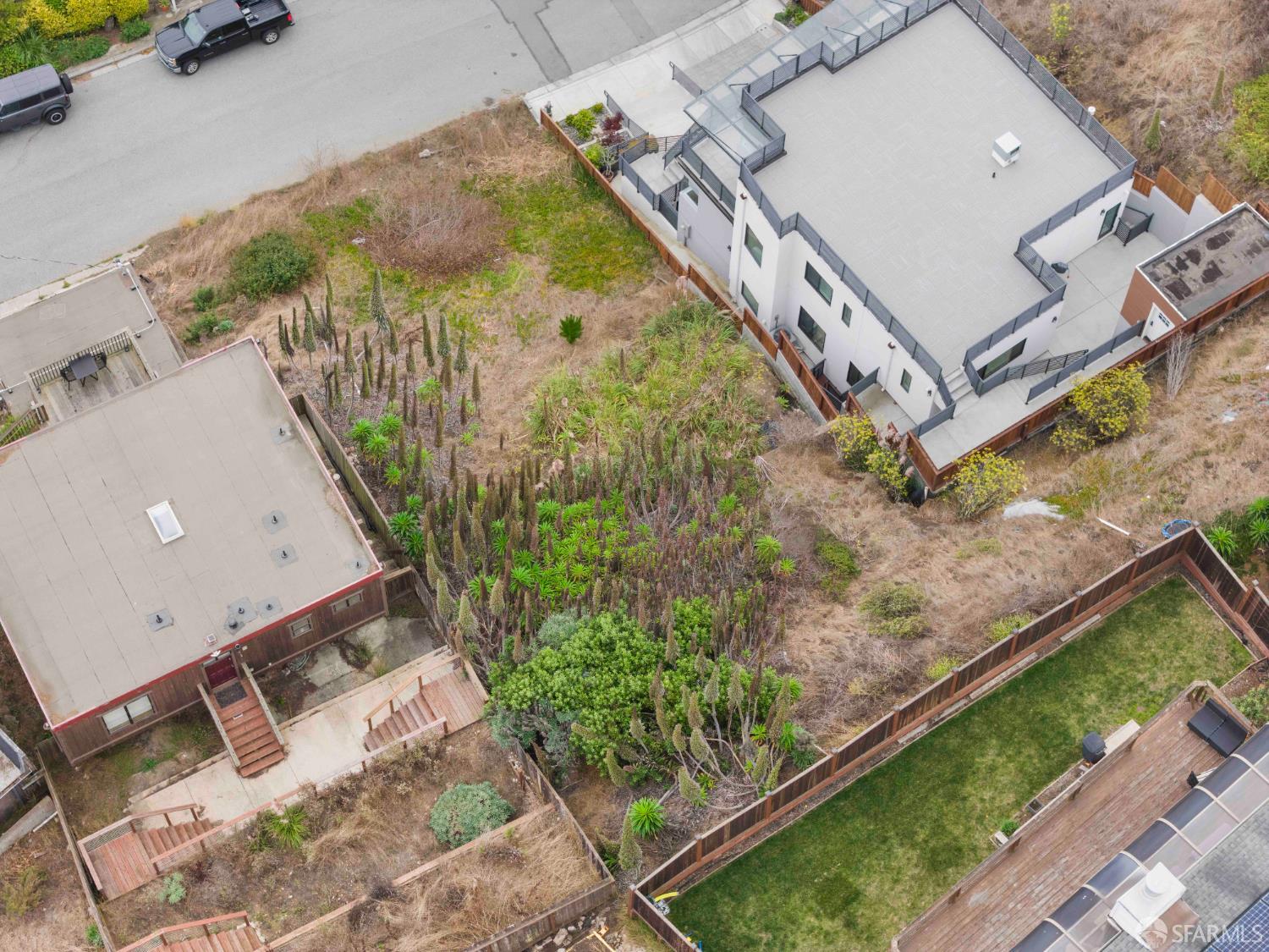 327 Beaumont Boulevard Pacifica, CA 94044 - Photo 7 of 7 a view of a backyard with plants