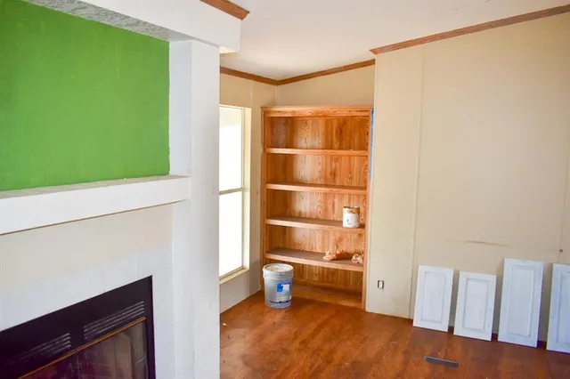 a room with furniture and a window