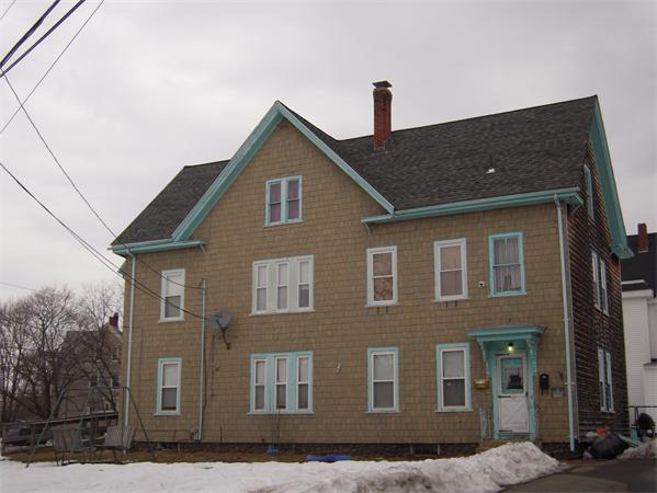149 Broad Street Whitman, MA 02382 - Photo 1 of 2 a front view of a house with a yard
