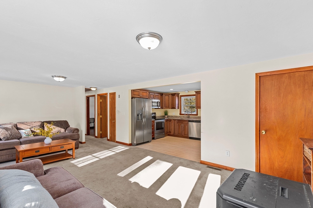 161 Wapping Road Kingston, MA 02364 - Photo 6 of 18 a living room with furniture and a couch