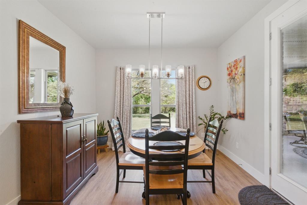 247 Gopher Road Weatherford, TX 76088 - Photo 12 of 35 a dining room with furniture and window