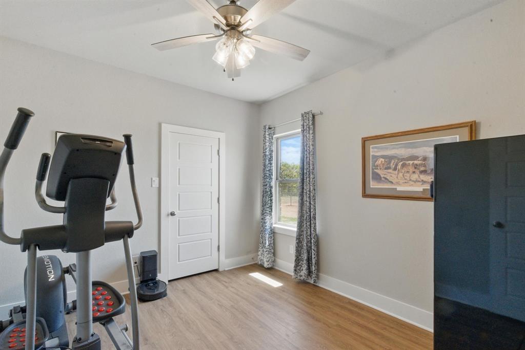 247 Gopher Road Weatherford, TX 76088 - Photo 27 of 35 a view of entryway with wooden floor