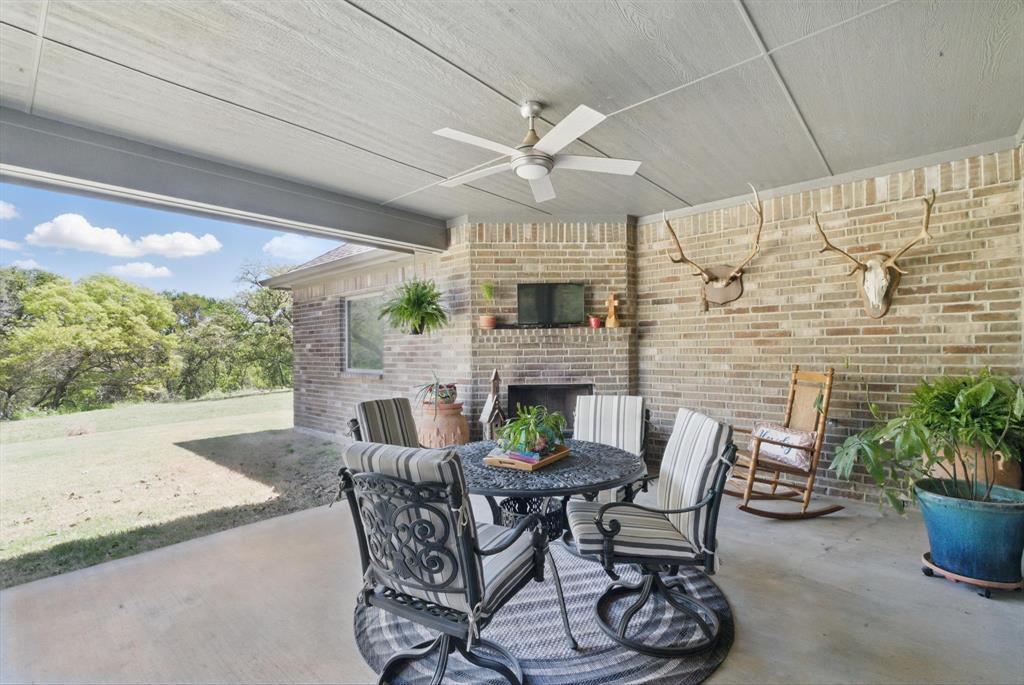 247 Gopher Road Weatherford, TX 76088 - Photo 29 of 35 a view of a dining room with furniture window and outside view