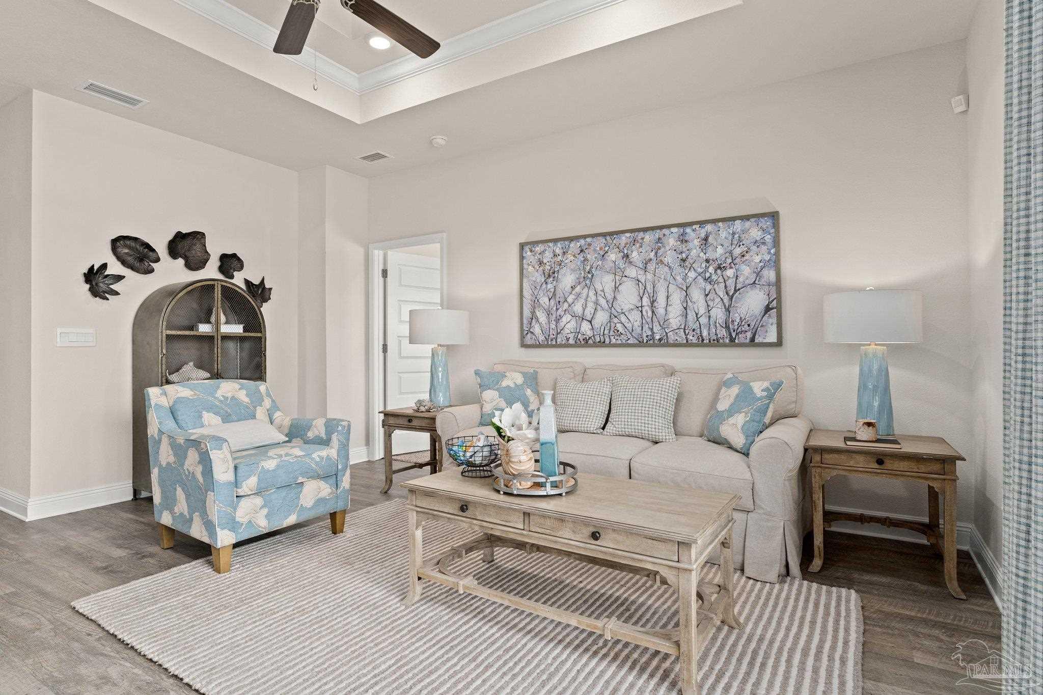 4946 Snipe Road Pace, FL 32571 - Photo 21 of 27 a living room with furniture and a rug