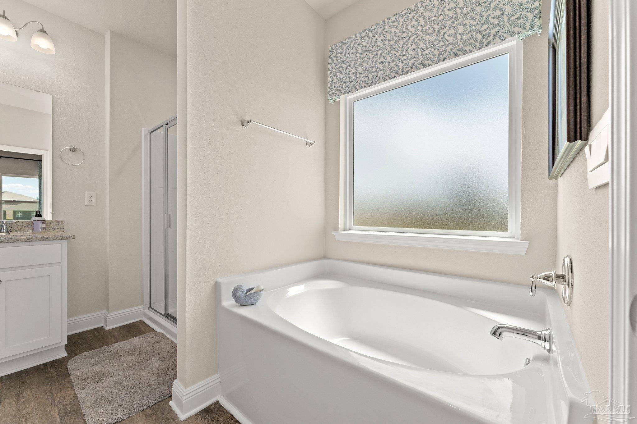 4946 Snipe Road Pace, FL 32571 - Photo 27 of 27 a white bath tub sitting next to a white sink