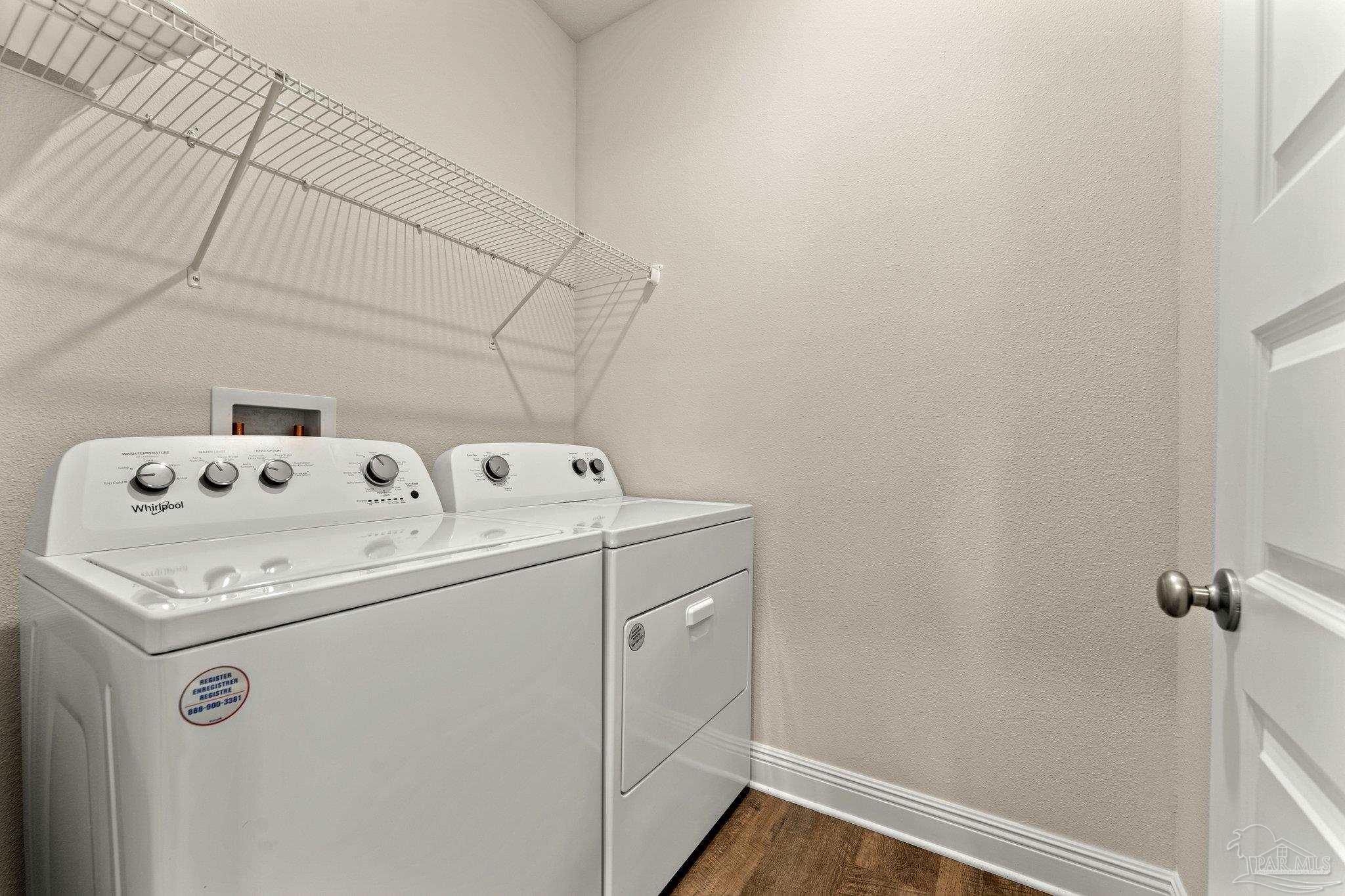 4946 Snipe Road Pace, FL 32571 - Photo 10 of 27 a utility room with dryer and washer