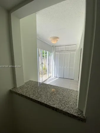 a bathroom with a shower and a toilet
