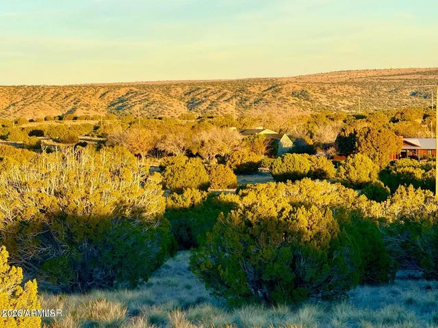 a view of mountain view with mountains in the background