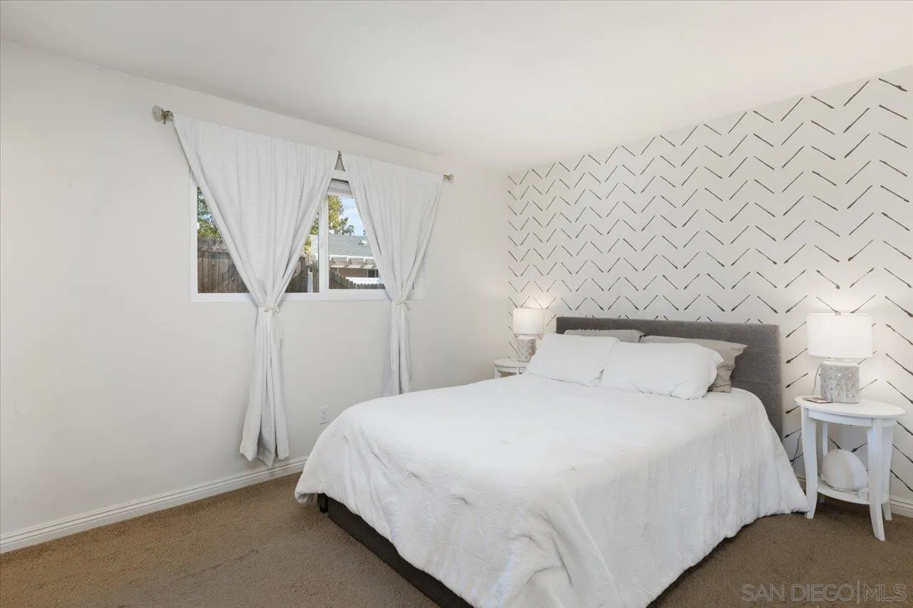 13433 Utopia Road Poway, CA 92064 - Photo 15 of 23 a bedroom with a bed and a window